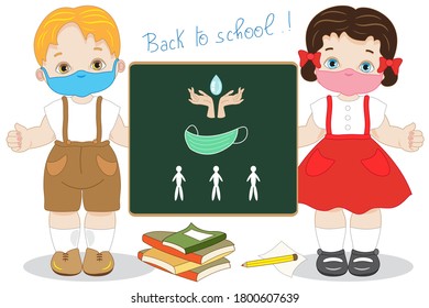 Two children with a large blackboard happily begin the lessons at school with a mask