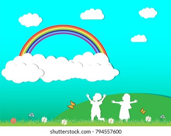 Two children and a rainbow in the sky