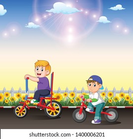 the two children are riding their bicycle in the afternoon