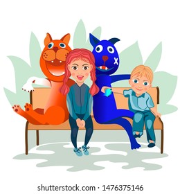 Two children sitting bench with two large cat toys. 