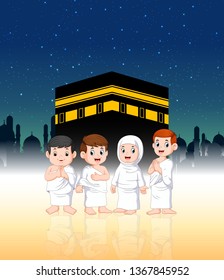 two children with their parents are doing pilgrimage in front of ka'bah