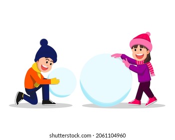 Two children trying to make a snowman