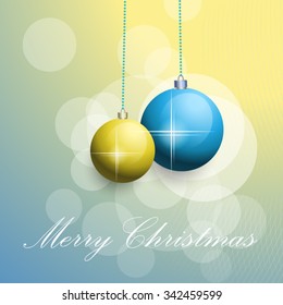 Two christmas balls on a gradient background