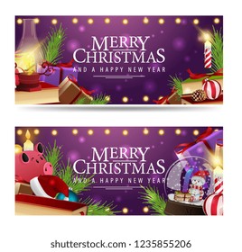 Two Christmas banners with a mountain of Christmas gifts