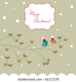 Two Christmas birds, sitting on the tree
