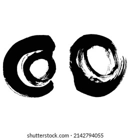 Two circles brushed with ink