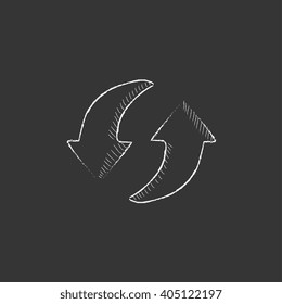 Two circular arrows. Drawn in chalk icon.