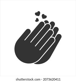 Two clapping hands for applause with a heart of gratitude coming out of them.