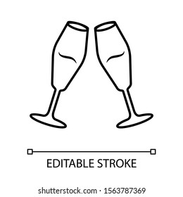 Two clinking champagne glasses linear icon. Glassfuls of alcohol drink. Wine service. Celebration. Glassware. Thin line illustration. Contour symbol. Vector isolated outline drawing. Editable stroke