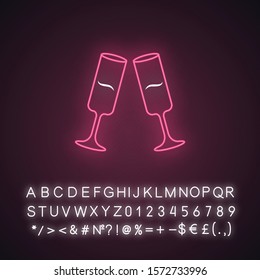Two clinking champagne glasses pink neon light icon. Glassfuls of alcohol beverage. Wine service. Celebration. Isolated Glowing sign with alphabet, numbers and symbols. Vector isolated illustration