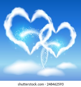 Two cloud hearts with glowing salute in the blue sky