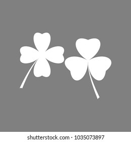 Two clover leaf. Quaterfoil. Quatrefoil. Vector. White icon on medium gray background. Isolated.