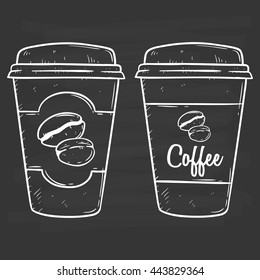 Two coffee cup using doodle art on blackboard background