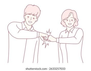 Two colleagues exchanging a fist bump, a powerful symbol of effective teamwork and collaboration in action