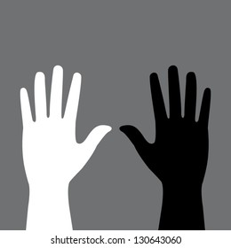 two colored hands on a gray background