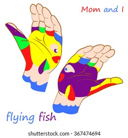 The two colorful hands with smiling fish painted with different colors. Hands folded in the form of floating fish. Isolated on white background.