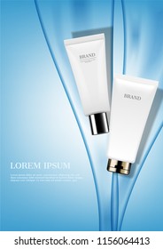 Two cosmetic tube on blue water stream