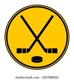 Two crossed hockey sticks and puck icon on white background. Vector illustration.

