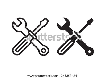 Two crossed tools a wrench and a screwdriver icon isolated on white background