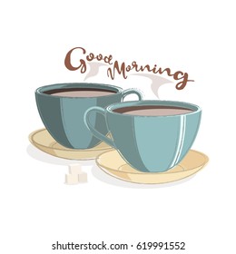 Two cups of hot drink with the inscription "Good morning"