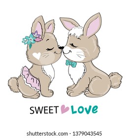Two cute bunnies and the inscription sweet love
