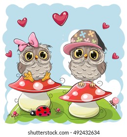 Two Cute Cartoon Owls are sitting on mushrooms