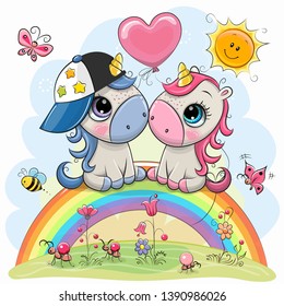 Two Cute Cartoon Unicorns are sitting on the rainbow