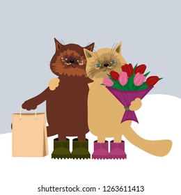 two cute cats in winter day 