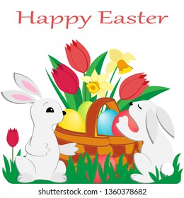 two cute Easter rabbits and a wicker basket with colorful painted eggs , red tulips and daffodils on green spring grass