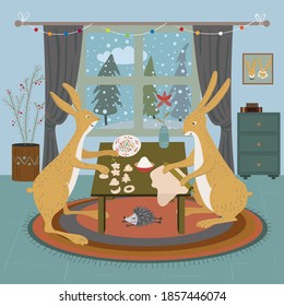 Two cute hares cooking in the kitchen. Rabbits are making cookies. Christmas scene.