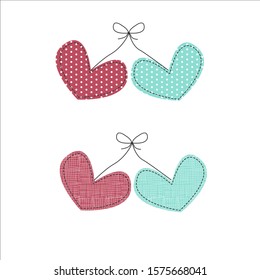 Two cute knotted love hearts of calico texture with dot and stitch in cartoon style in pink blue colors. Vector illustration. 
 design for St.Valentine day