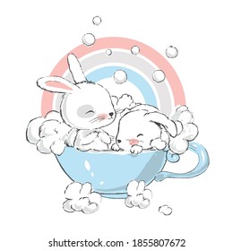 Two cute little hares. Cute white baby bunnies take baths in a cup.