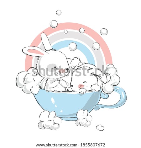 Two cute little hares. Cute white baby bunnies take baths in a cup.
