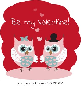 Two cute owls in love