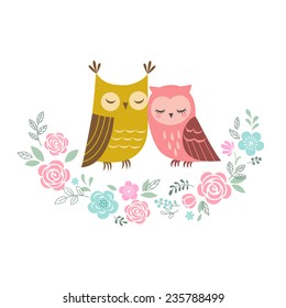 Two cute owls in love and flower wreath.