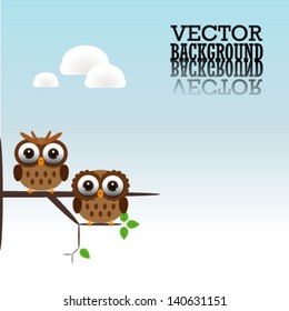 Two cute owls on the branch