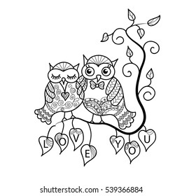 Two cute owls on a tree branch. Hand-drawn owl in doodle art style.Template for coloring books. Card for Valentine's Day.