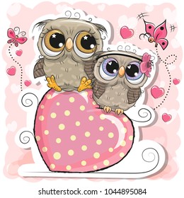 Two Cute Owls is sitting on a heart on a pink background