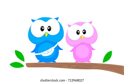 Two Cute Owls is sitting on a wood branch