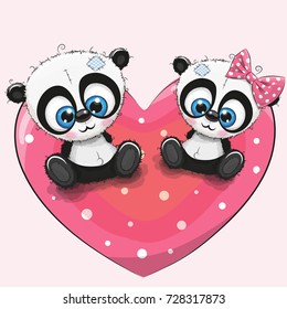 Two cute Pandas is sitting on a heart