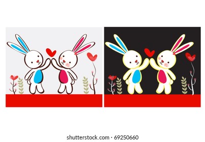 Two cute rabbits in love.