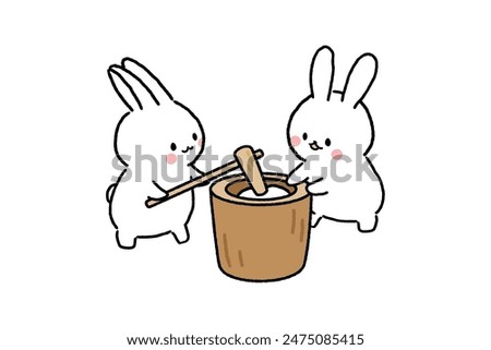 Two cute rabbits pounding mochi.