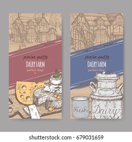 Two dairy farm shop labels with farmhouse, color milk can, mug and cheese plate. Placed on cardboard texture. Includes hand drawn elements.