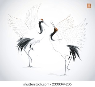 Two dancing crane birds on white background.Traditional oriental ink painting sumi-e, u-sin, go-hua. Hieroglyph - double luck