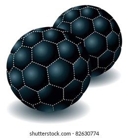 Two dark soccer balls