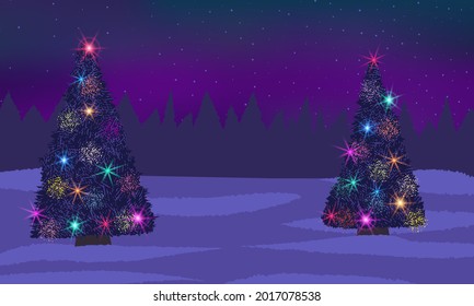 Two decorated Christmas trees on a winter background with distant forest.