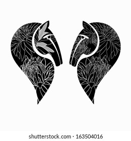 Two decorative horse heads. Vector illustration