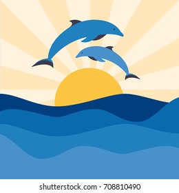 Two dolphins jumping out of the sea