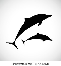 two dolphins jumps silhouette vector illustration EPS10