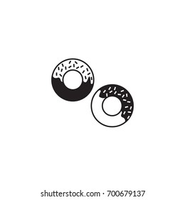 Two donuts with dressing and sprinkles black vector icons isolated on white background